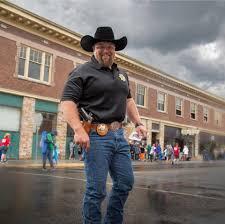 Man in cowboy on a rural street